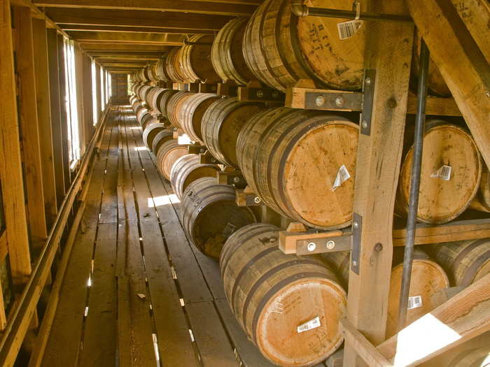 Each barrel is rolled into place and weighs about 560-pounds. The temperature can reach up to 120 degrees Fahrenheit and drops to 40 degrees Fahrenheit in the winter. The barrels sit here for the next 4 to 7 years.