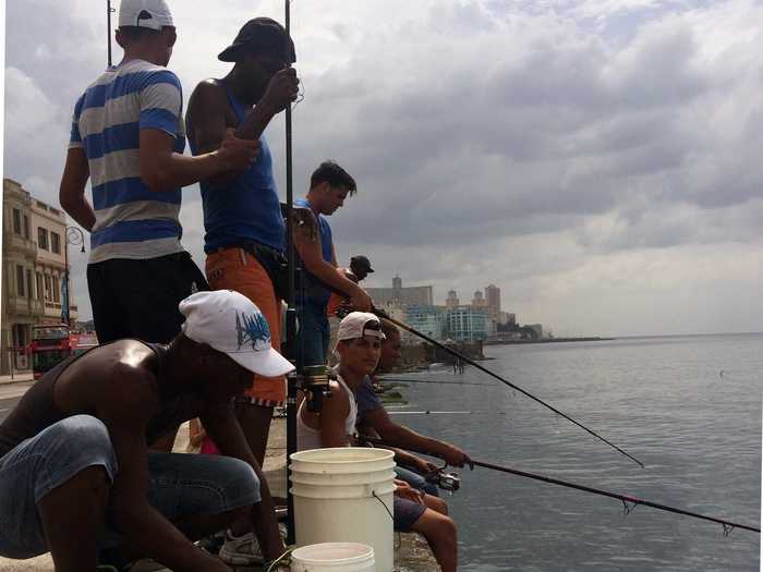 We decided to walk on the Malecón, a long path between the seawall and a major Havana roadway. The Malecón was like New York City