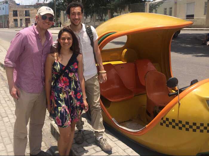 The next day we discovered our favorite way of getting around Havana, the "cocotaxi." We crammed into this three-wheeled, egg-shaped scooter and rode along the Malecón to spend the entire day walking around Habana Vieja.