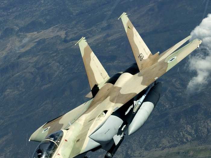 An Israeli Air Force F-15I maneuvers away after receiving fuel from a KC-135 Stratotanker over Nevada