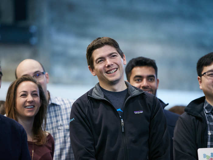 The smiling guy in the middle is Jeff Siebert, Twitter