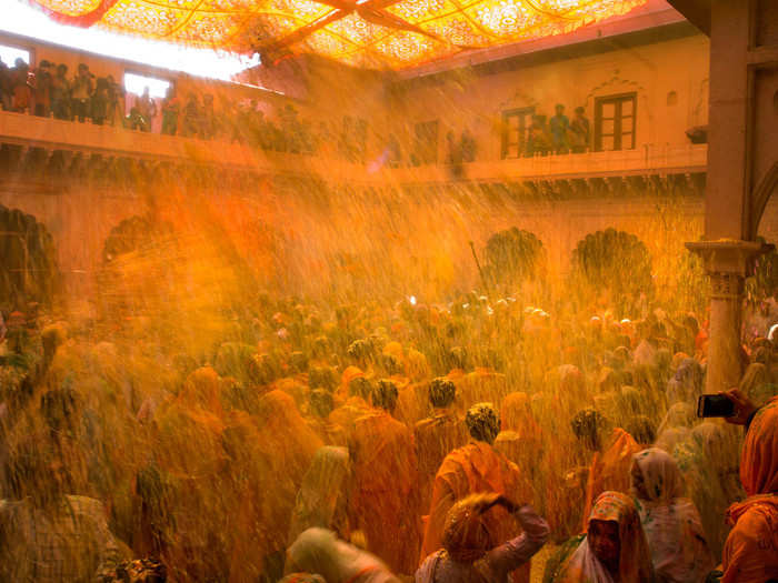 Krishna took this seriously and applied colored powder and water to Radha