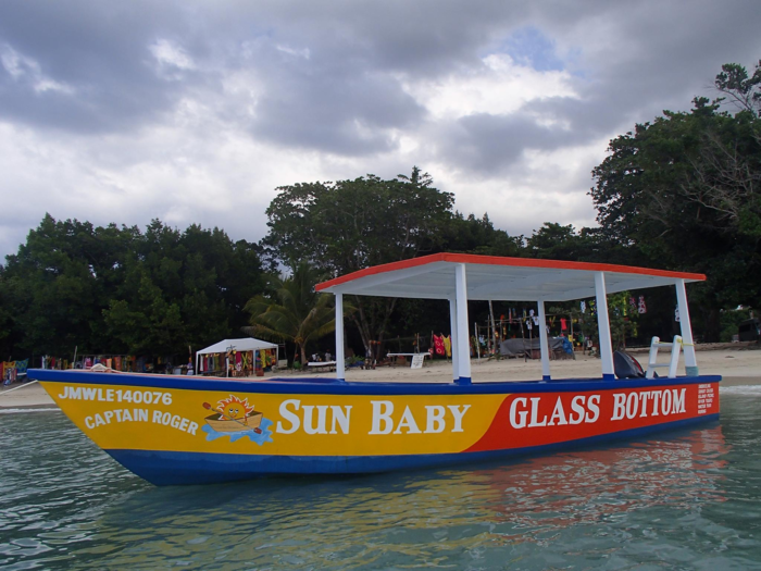 Another signature experience is glass-bottom boat rides in Negril. You