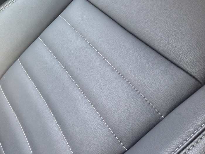 The seats in our test car were leather, with modest topstitching. As with most Ford seats, they