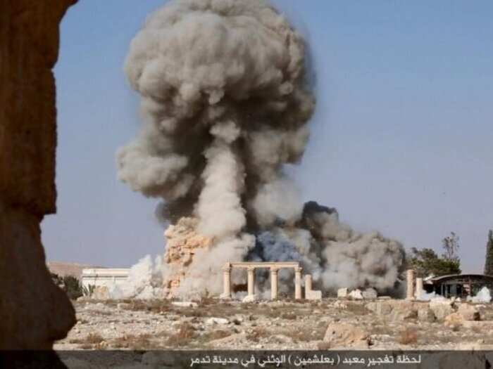 An ISIS-distributed image shows the destruction of a Roman-era temple in Palmyra.