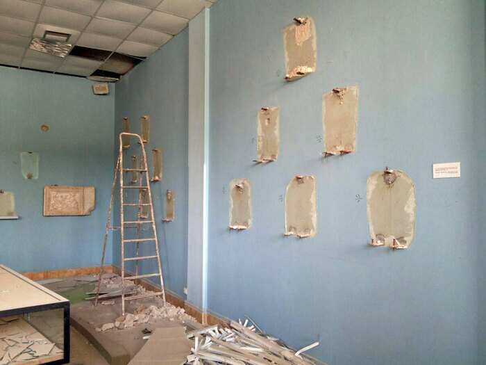 Empty display stands are pictured inside the museum of the historic city of Palmyra, after forces loyal to Assad recaptured the city.