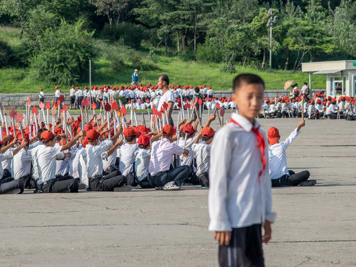 Tourism guidelines encourage visitors to take photos of the student exercise groups. These kids were rehearsing for a celebration of the 70th anniversary of the Workers