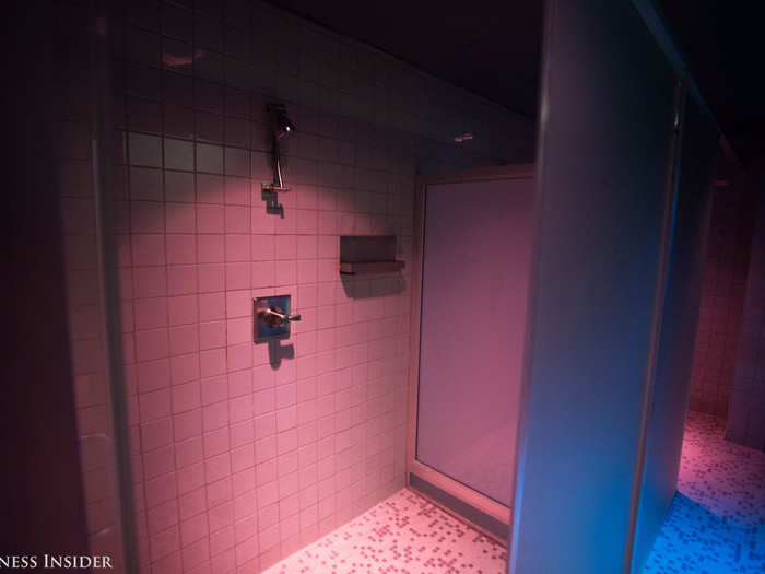 The locker rooms come with showers that are just as dramatically lit as the rest of the gym.