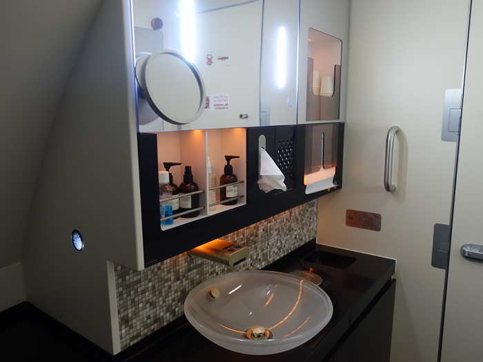 Etihad has two bathrooms for its first class apartment passengers: one has a shower, while the other one, located at the tip of the nose, is a bit longer and more spacious (similar to Emirates).