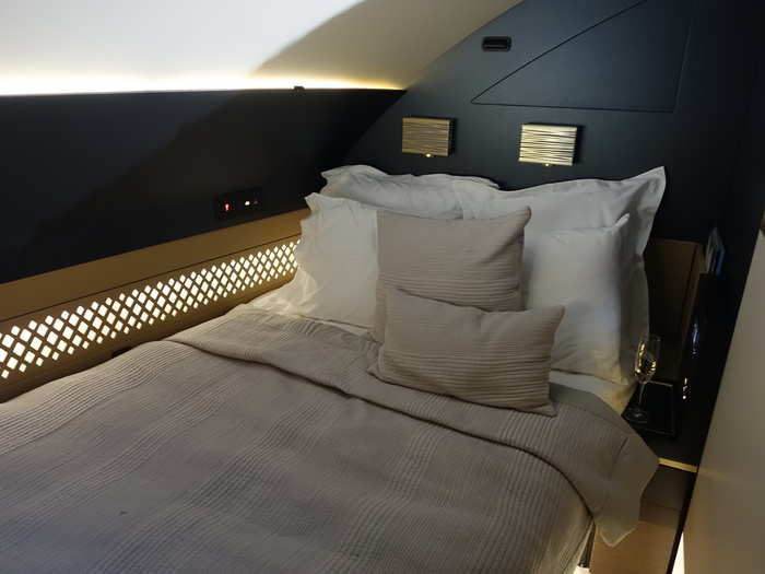 After a brief overview of the living room, the butler unlocked the door and we walked into the private area of The Residence. Instead of having a sofa that converts into a bed, The Residence is furnished with an actual full double-sized bed. This is a first among all airlines.