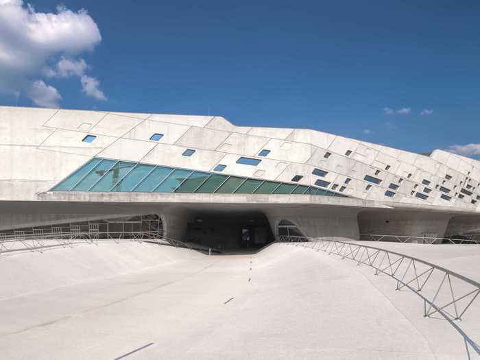 And she designed the Phaeno Science Center in Wolfsburg, Germany, which was also completed in 2005. The New York Times called it "the kind of building that utterly transforms our vision of the future."