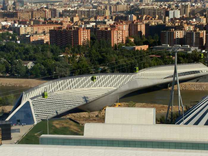 She designed the Bridge Pavilion in Zaragoza, Spain as one of the main landmarks for Expo 2008. The 919-foot covered bridge spans the River Ebro.