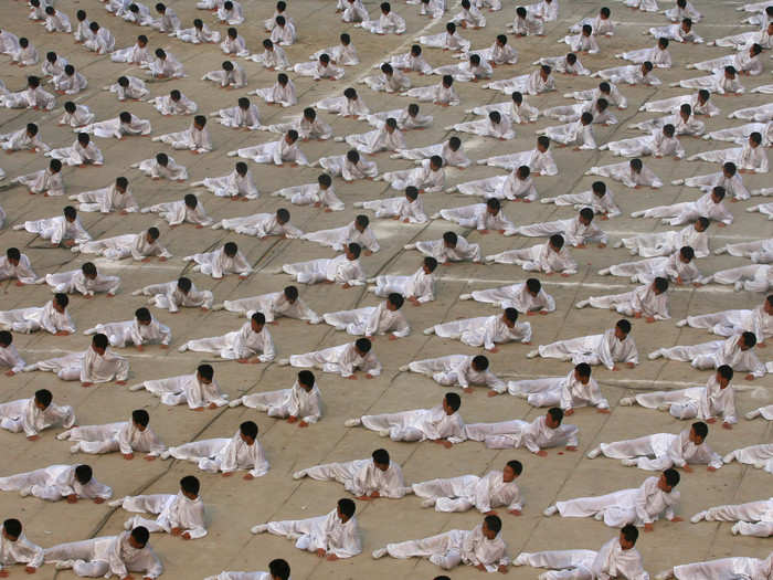 Martial arts is very popular in China. Here, students from the Tagou martial arts school in Henan province practice at a training base on the outskirts of Beijing.