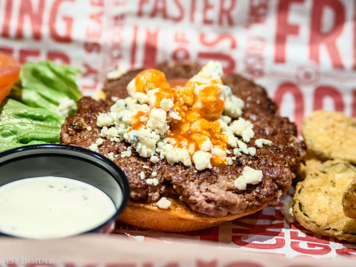 ... and the buffalo and bleu cheese burger with a side of fried pickles. Both burgers were surprisingly cheap for "better burgers" in NYC: each burger is $7.29.