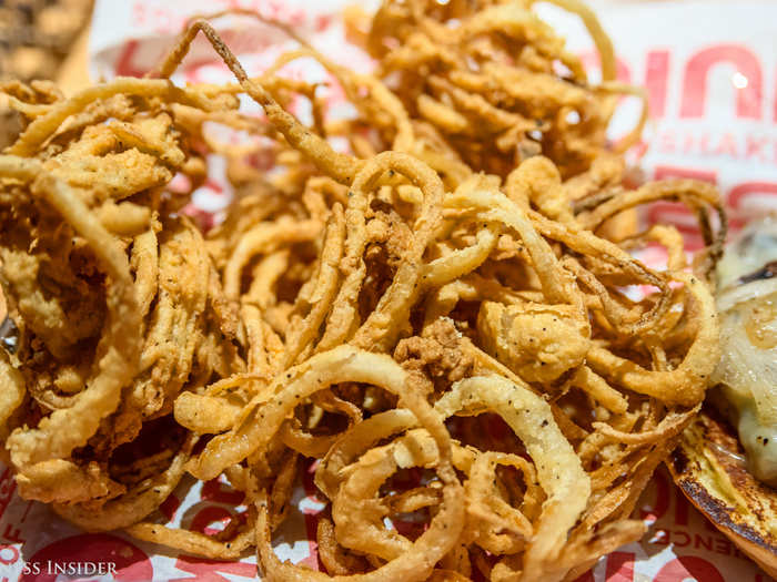 The onion rings are more strings than rings, which adds an extra crispy crunch. They