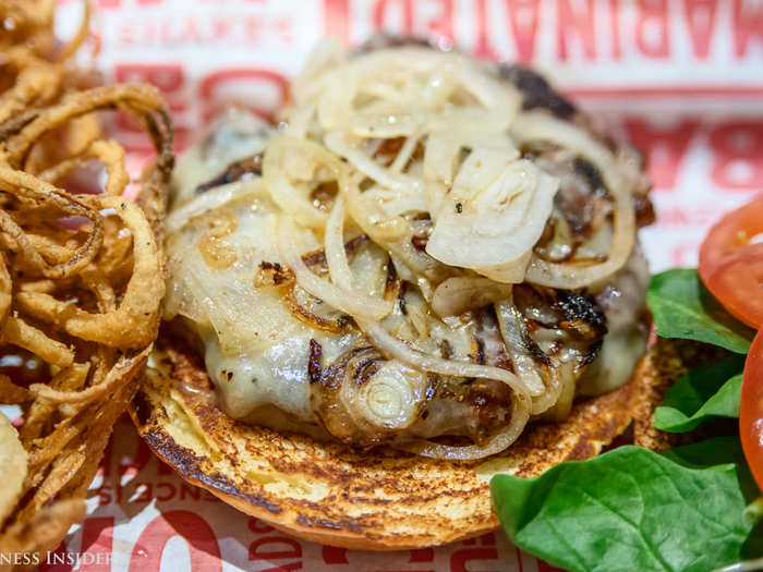 The burgers are served open-face, with a hefty amount of toppings. The grilled onions on the "New Yorker" were still steaming.