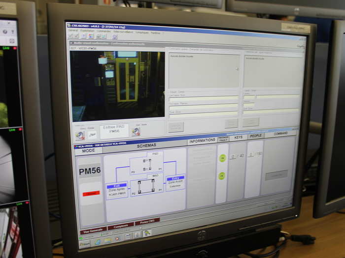 To get down to the LHC (through the doors pictured here), you need to wear a helmet, special shoes, a detector measuring oxygen, and a device that allows you to breathe.