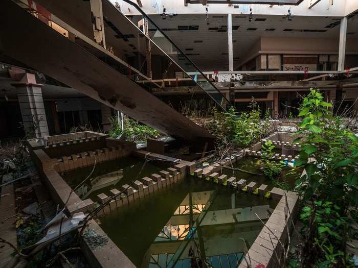 "All has since fallen, and I now wander the enchanting, echoing halls of a place where lives were lived, and jobs were worked," Joo wrote, referring to his journey through the abandoned mall.