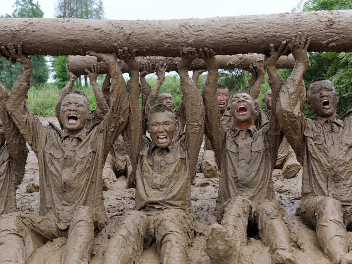 Heavy lifting also takes place in muddy water.