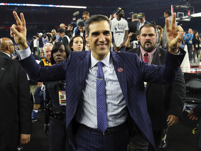 Jay Wright barely celebrated, but did walk off the court with a big smile.