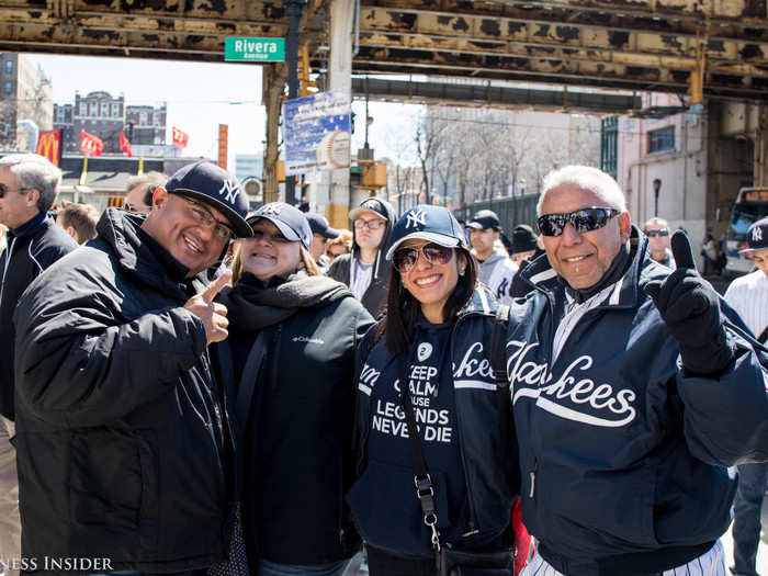 Other fans traveled from out of state, such as the family pictured below who traveled from Texas. They had to change their flights home due to the game getting postponed — but "it was worth it!" they said.