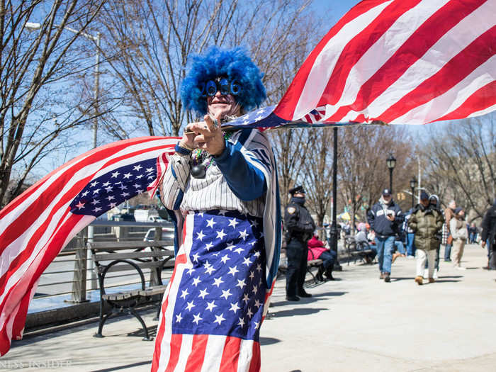 This guy walked around sporting American flags, a blue wig, and a New York Yankees cape.