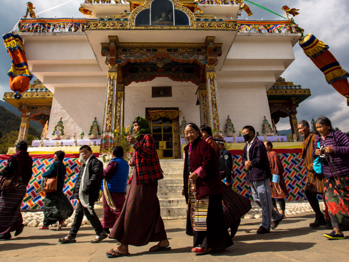 Thimphu locals often go to the Memorial Chorten to pray. They walk around the temple in a clockwise direction while reciting prayers and whirling the large red prayer wheels.