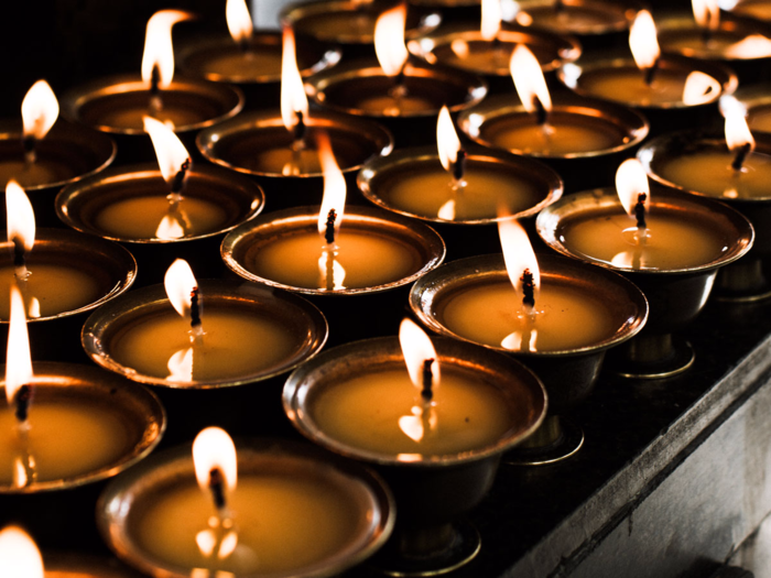 Pictured here are yak butter lamps, which are made from the milk of yaks. According to Weir, yak is used for everything from clothing to food, and for preparing a tea that is commonly found throughout homes in Bhutan.