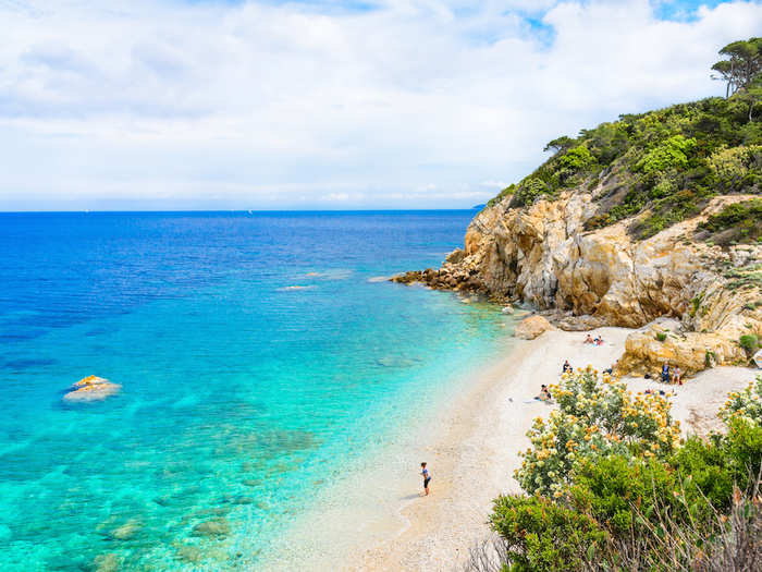 18. Elba Island, Italy — This Tuscan island is known for its pristine beaches with clear, turquoise water and golden sand, making it a prime holiday spot in the Mediterranean.