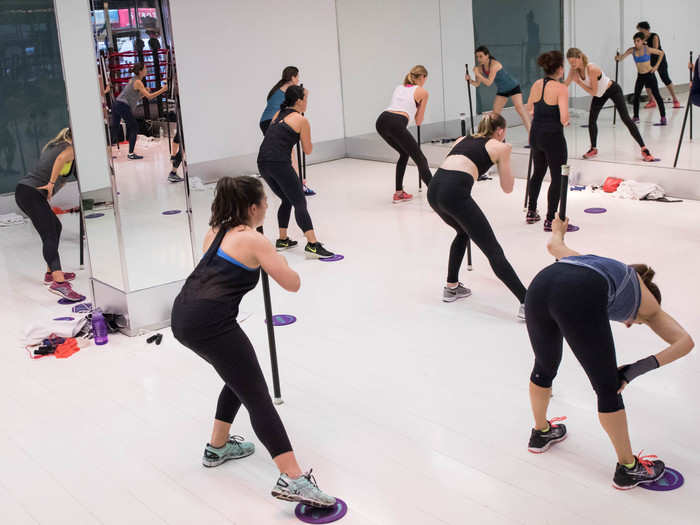 These free-standing bars helped us keep our balance as we attempted even more lunges. By this point, every muscle in my lower body was feeling the burn; you can see the woman in front of me taking a moment to catch her breath.