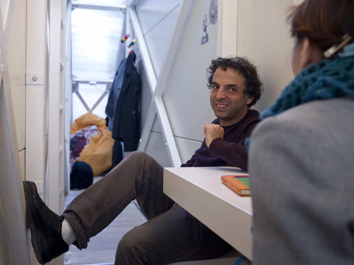 On the first floor, the living room is quite cramped, as demonstrated by Etgar Keret