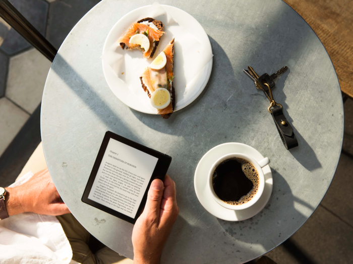 The device weighs 4.6 ounces, and is a little bigger than a regular coffee plate. This should give a better idea of how big it is.