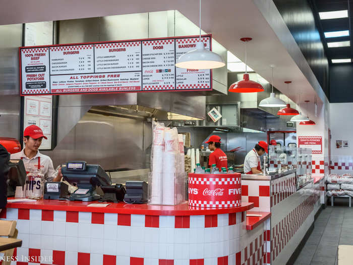 The design of Five Guys restaurants in decidedly different than most better-burger chains. Gone are the warm wood accents, brushed nickel, and dim light ...
