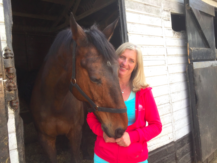 Tucked behind the shops and the bars is the the Wimbledon Village Stables which is owned by Carol Andrews. Here she is with her horse Pod.