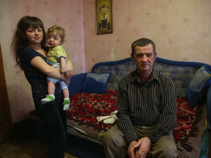 Alexander Malish, 59, pictured with his daughter Anya and her son Nikita