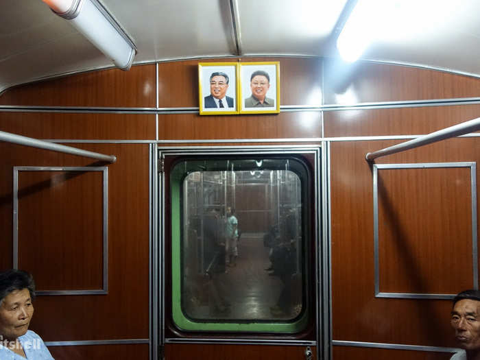 Portraits of Kim Il-Sung and Kim Jong-Il were present in every train carriage. By law, they’re framed thicker to the top, angling downwards to oversee those in any room they’re placed. Revolutionary anthems filled each carriage to otherwise silence, commuters didn’t speak or interact with each other and boarding or alighting the train was an effortless, polite process with self-organised order.