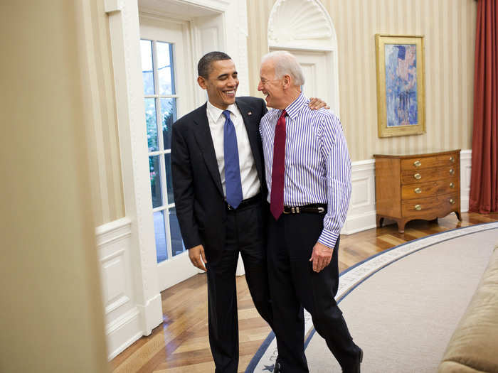 Obama embraces Biden in the Oval Office after a meeting on the budget on April 8, 2011.