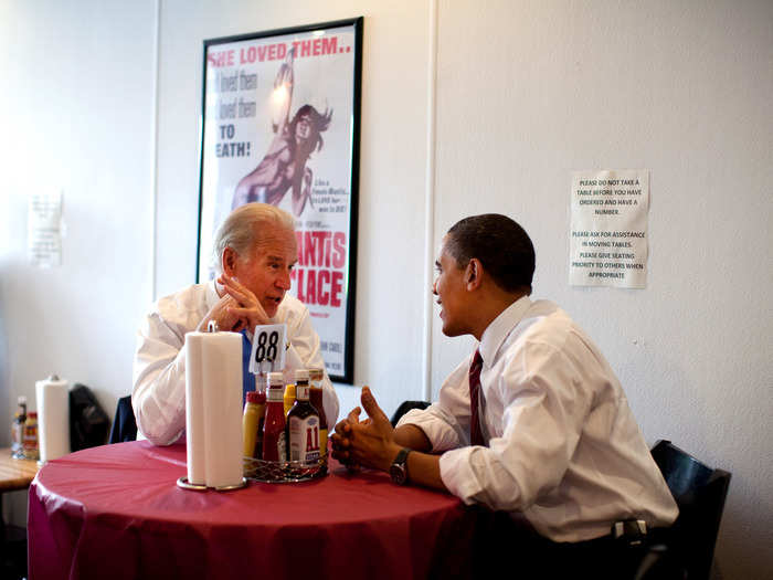 Obama and Biden wait for their lunch during an unannounced visit to Ray