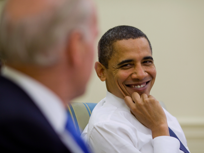 Obama smiles at Biden during a meeting in the Oval Office.