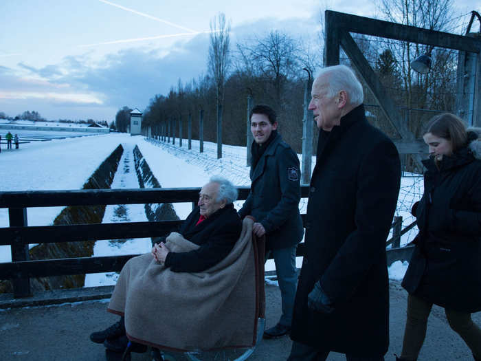 Biden and his granddaughter take a tour at the Dachau Concentration camp with Max Mannheimer, a 95-year-old Holocaust survivor, in Dachau, Germany on February 8, 2015.