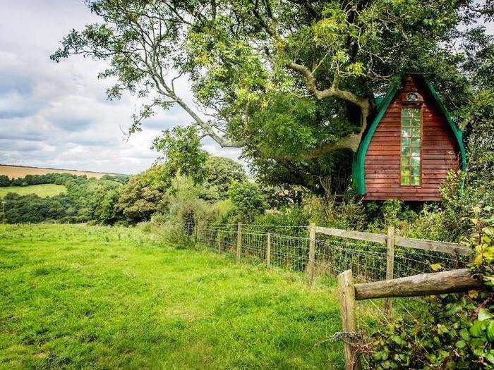 Situated in the remote Cornish countryside, the treehouse is a romantic place to stay, with gorgeous rural views overlooking Falmouth Bay and the fields of Tregaminion. "On windy days it