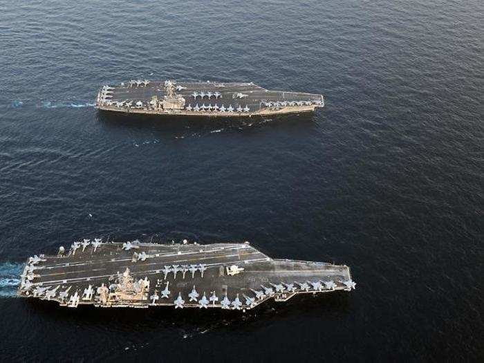 USS Abraham Lincoln and USS John C. Stennis join for a turnover of responsibility in the Arabian Sea.