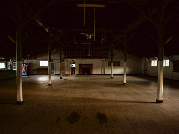 A roller skating rink seems to be in relatively good shape.