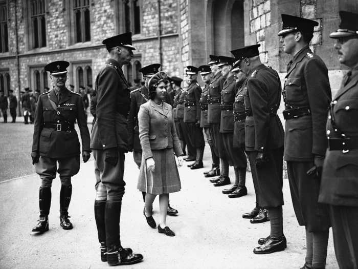 1942: A 16-year-old Elizabeth often met with troops and spoke to them. She was appointed colonel-in-chief of the Grenadier Guards by her father in 1942 and made her first public appearance inspecting the troops that year.