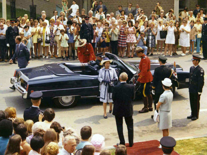 1973: Queen Elizabeth II, with her husband Prince Philip, left, arrive at an "Old Canada" exhibition, in High Park, Toronto.