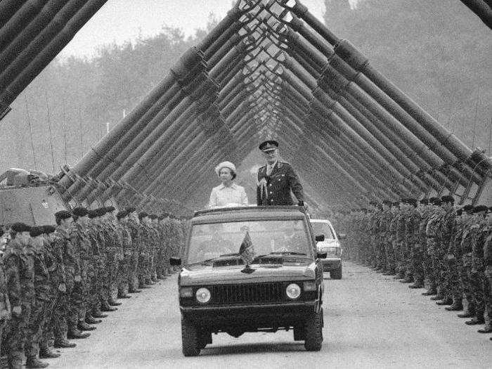 1984: Queen Elizabeth II arrives through the avenues of guns during the 2nd day of her review of the Royal Regiment of Artillery in East Germany at Dortmund on Wednesday, making for a dramatic picture.