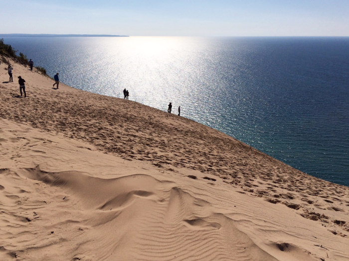 At Sleeping Bear Dunes National Lakeshore in Michigan, you can take in spectacular lake views from bluffs that tower 450 feet above the shore. Its prized dunes and beaches are suffering from invasive algae and mussel species, as well as rising phosphate levels.