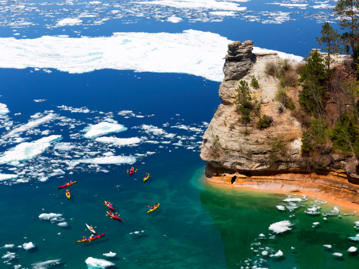 Pictured Rocks National Lakeshore in Michigan is known for its colorful sandstone cliffs and array of waterfalls, beaches, and forests. But the rise of air and water temperatures, plus a reduction in ice coverage, are beginning to affect the area