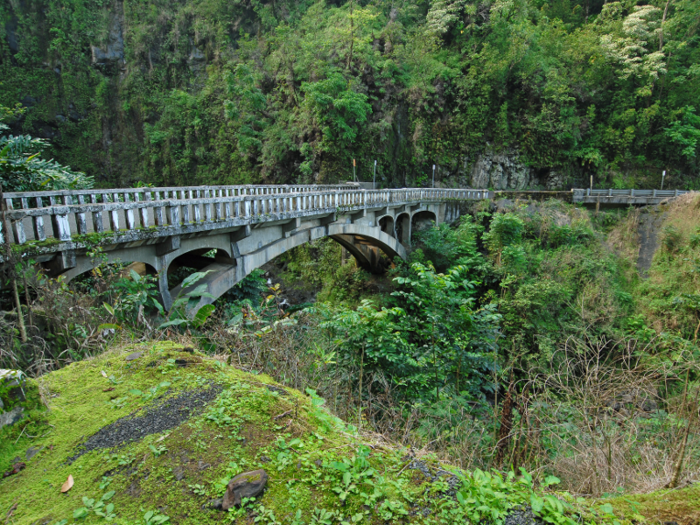 The Road to Hana is a popular driving tour on the north side of the island. The narrow road has 600 curves and 54 bridges, many of them on just one lane. Those braving the harrowing road will be rewarded with stunning waterfalls, lush rainforest, and hidden beaches.