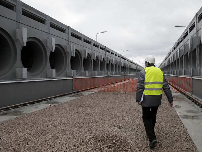 Once the new structure is in place, robot-controlled machines will take apart the ruined reactor and sarcophagus of the fourth unit before collecting the remaining nuclear waste, to be stored nearby. The Associated Press reports that the work is due to start in 2017.